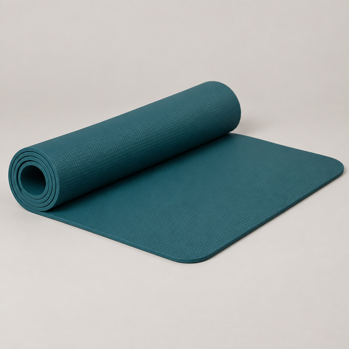 Deep teal 6mm non-slip TPE exercise mat partially rolled